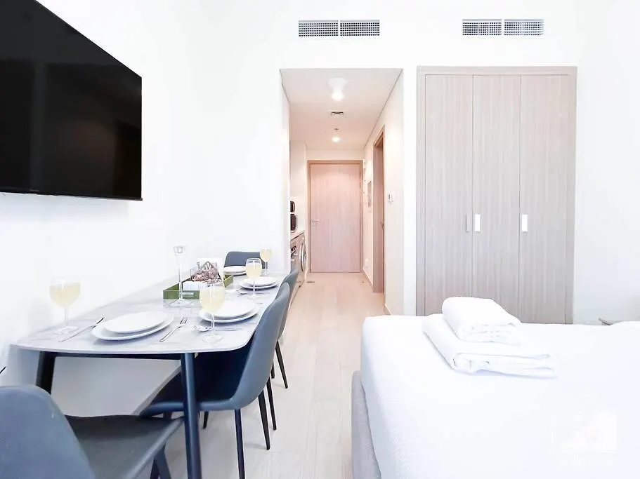 Balcony Studio Haven In Riviera Dubai Apartment